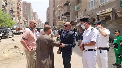 حي العمرانية يشن حملة لكلبشة السيارات المخالفة ورفع مستوى النظافة| صور