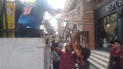 رفع ١٣١ حالة إشغال لمحال ومقاهي إمبابة | صور