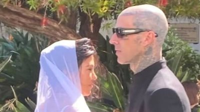 رسميا.. زواج كورتني كارداشيان وترافس باركر |صور