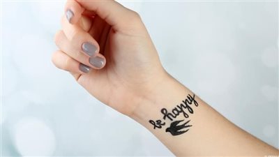 تفسير حلم الوشم في المنام وعلاقته بقرب انتهاء المشاكل