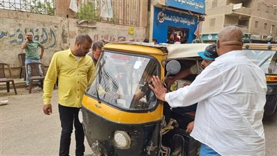 ضبط 27 توك توك مخالفا بمحور أنور السادات في الطالبية | صور