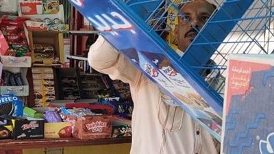 كلبشة سيارتين ورفع متوسيكلين لتعديهم علي الطريق العام بجنوب الجيزة | صور