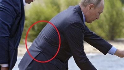 حقيقة ارتداء بوتين سترة واقية من الرصاص