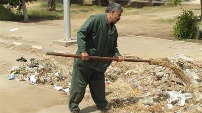 حملة نظافة بشوارع ومحلات سوق الجملة في أكتوبر| صور