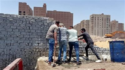إزالة 4 أسوار وأعمال بناء مخالف في  حي الطالبية | صور