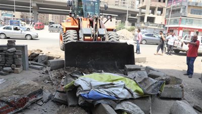 إزالة التعديات والمنشآت المخالفة بشارع اللبيني بالجيزة | صور
