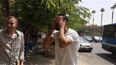 12 صورة ترصد مواجهة المصريين لموجة الحر | صور