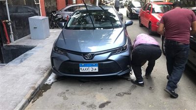 تحرير 12 محضرا للسيارات المخالفة بحي الدقي | صور