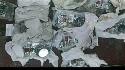 إحباط تهريب 100 ألف جنيه و55 ساعة داخل طردين بمطار القاهرة