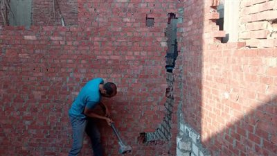 إزالة مخالفة بناء بشارع جامع الملك متفرع من اللبيني في الجيزة | صور