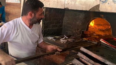 أفران الشوي البلدي.. تعرف على أجمل طرق طهى الأسماك في بورسعيد| فيديو