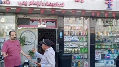 وضع صناديق للقمامة أمام المحال التجارية بالوراق|صور