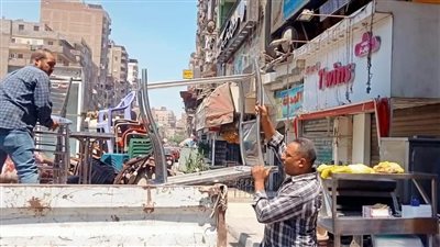 رفع ١٠٠ حالة إشغال بشوارع ومحيط مدارس حي الوراق| صور