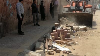 حملة لإزالة إشغالات الباعة الجائلين بمحيط سوق الكونيسة بالجيزة | صور