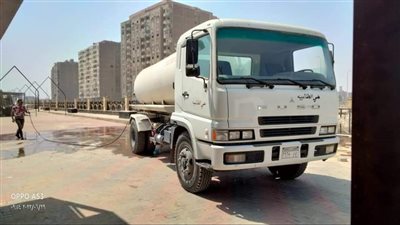 حملة لكلبشة السيارات المخالفة وغسل الممشى السياحي بالجيزة | صور