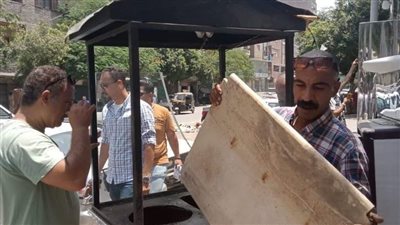 رفع 421 حالة إشغال من نهر الطريق في بولاق الدكرور | صور