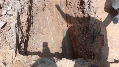 إصلاح هبوط بطبقة الطريق بشارع زمزم بجنوب الجيزة | صور