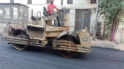 بدء رصف وتطوير شارع علوبة بالعمرانية | صور