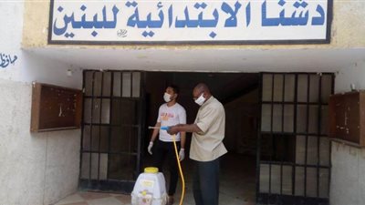 فرق مكافحة كورونا بقنا تطهر وتعقم مدارس لجان الثانوية العامة | صور