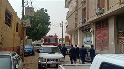 الحماية المدنية تنقذ طفلا علق بأسانسير نتيجة سوء الطقس بأسيوط | صور