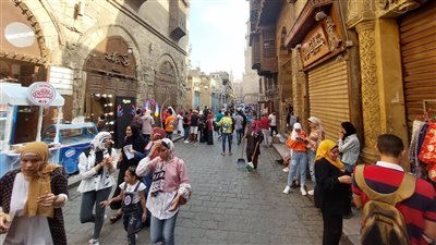 14 صورة ترصد الاحتفال بعيد الأضحى في شارع المعز 