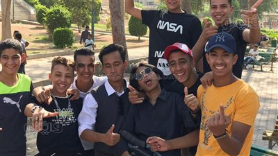 إقبال كبير من جنسيات مختلفة على الحديقة اليابانية للاحتفال بالعيد| فيديو وصور