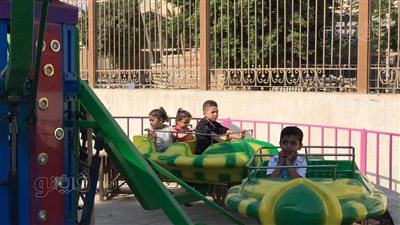 رسم التاتو وأقنعة الحيوانات والملاهي أبرز مظاهر الفرحة في الحديقة اليابانية | فيديو وصور