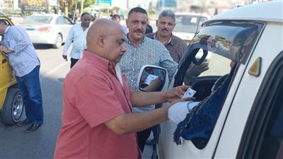 ضبط 24 سيارة مخالفة لتعريفة الركوب بالجيزة | صور