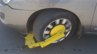 كلبشة 5 سيارات وتحرير محاضر مخالفة في الدقي