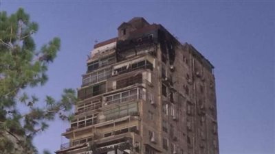 إخماد حريق نشب داخل شقة سكنية بالطابق الأخير في الدقي |صور