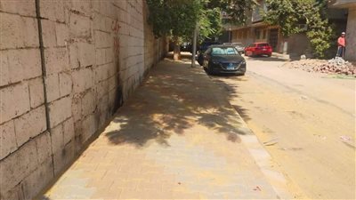 متابعة أعمال الرصف بشارع أمون بالعمرانية في الجيزة | صور