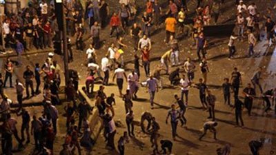 إصابات وتحطيم محال في اشتباكات الأهالي والإرهابية بـ