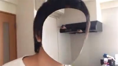 ياباني يستخدم كاميرا «آي فون X» لإخفاء وجهه (فيديو)