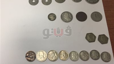 ضبط راكب حاول تهريب 19 عملة أثرية بمطار القاهرة