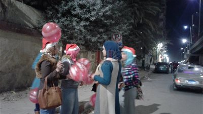 مسلمات يشاركن الأقباط احتفالات رأس السنة في أسيوط (صور)