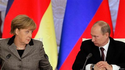 ميركل تطالب بوتين بالاعتراف بالانتخابات الأوكرانية