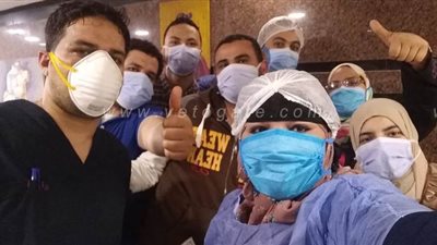 لحظة خروج 21 متعافيا من مستشفى العزل بالدقهلية | صور