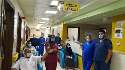 خروج أكبر عدد للمتعافين من فيروس كورونا من مستشفى العزل في إسنا | صور