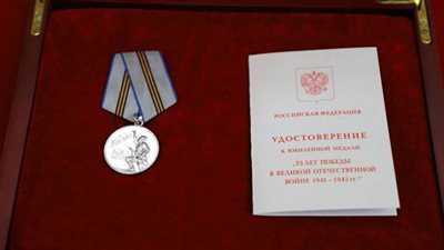 بوتين يهدي ميدالية النصر لزعيم كوريا الشمالية |صور