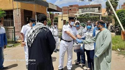 تعافي وخروج 12 حالة مصابة بكورونا من مركز اليونسكو بالمنوفية | صور