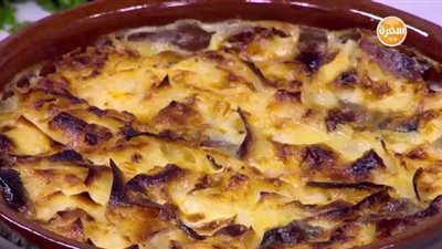 لمحبي الحلويات.. طريقة عمل أم علي بالتمر | فيديو