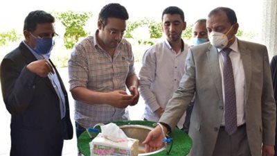 تصنيع أول بوابة تعقيم ووحدة غسيل يدوي إلكتروني بجامعة بني سويف