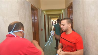 العائدون من الخارج داخل الحجر الصحي بالمدينة الجامعية بالقاهرة | صور