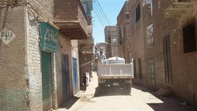 عزل ذاتي وأعمال تطهير.. إجراءات داخل الخطارة بقنا لمواجهة كورونا | صور