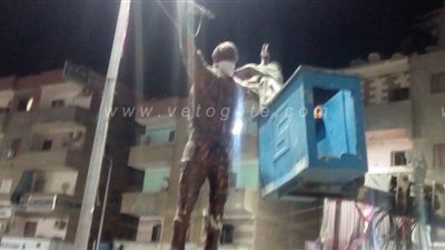 بعد ظهور إصابات بكورونا.. وضع كمامة على وجه تمثال الباجور ومسئول يكشف السبب | صور