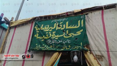 بالصور.. انتشار لافتات «الصوفية» و«الرفاعية» بمولد السيدة زينب