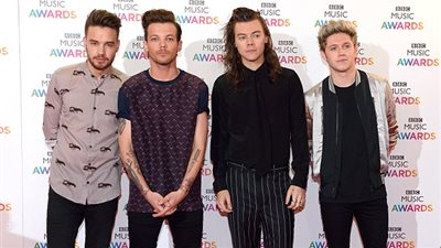 بالصور.. زين مالك يهنئ لويس توملينسون على مولوده الأول