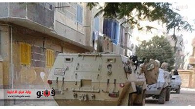 بالصور.. المدرعات تؤمن منزل قبطي متهم بقتل ضحية اشتباكات الفيوم