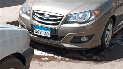 تحرير محاضر غسيل سيارات بالطريق في حى العجوزة