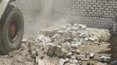 إزالة سور بناء مخالف في كرداسة | صور